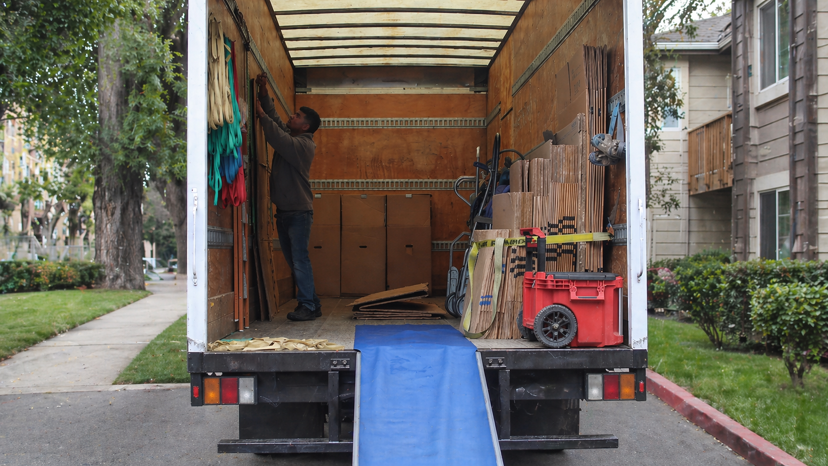 FairPrice Movers worker inside moving truck